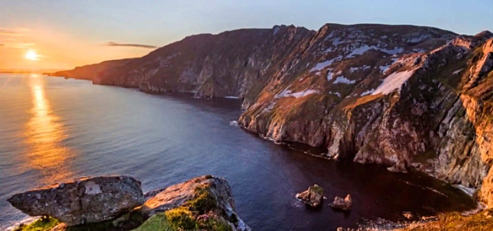 Handwoven Donegal Tweed with scenic landscape of South West Donegal